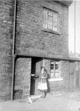 House on Benty Lane. Lady in doorway is Mrs Margaret Robinson