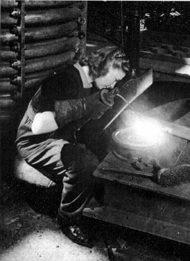 Female worker at Thomas W. Ward's factory during World War II