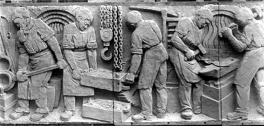 Carving of workmen in Weston Park Museum by W.F. Tory