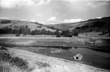 Ruins of Derwent Village, Ladybower Reservoir, revealed by the drought of 1949, Derwent Hall, left