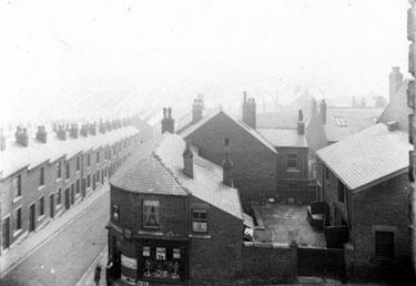 Elevated view of stables and corner shop No. 31, Industry Street  (foreground) and terraced housing, Whitehouse Road (left), Walkley