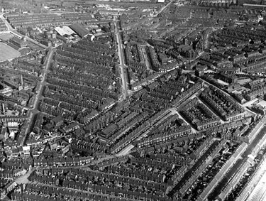 Aerial View -Highfield and Sharrow including Club Garden Walk and Sharrow Street, foreground, London Road, Hill Street and Alderson Road, centre, Bramall Lane and Football Ground, rear