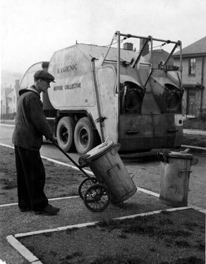 S.M.' System of Dustless Refuse Collection, emptying the bins