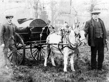 Exhibiting a horse drawn dust cart, W. Schofield right of picture