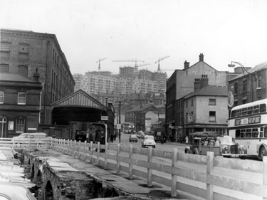 Broad Street looking towards Park during the construction of Park Hill and Hyde Park Flats, Wharf Street Goods Depot on left, Industry Inn, right