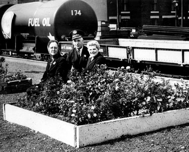 Mrs. Kath Ledger, Mr. T Brant, (station master 1947-62) and Mrs. Lena Marsh, Darnall Station, Best kept Station on Eastern Region, 1962