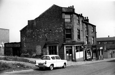 Upper Allen Street at the junction Daisy Walk with showing H. Clethro's betting shop at No. 186 and the Black Horse public house on the corner of Brownell Street and Upper Allen Street