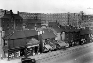 Park Hill Flats and Nos. 122 - 96 Duke Street, No. 122 Thomas Berry, chemist; No. 120 Percy Lee, newsagent; Nos. 114 - 116 William Talbot, butcher; No. 112 John Shentall Ltd., grocers and Park Elementary Schools in background
