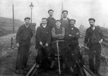 John George Mayes, foreman platelayer (possibly far left) with a team of workers, Sheffield District Railway at West Tinsley Station