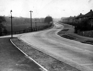 East Bank Road from East Road, looking towards, No 291, Midhill Working Men's Club and Institute Ltd., left (behind trees, former Midhill House) 	