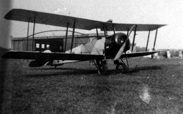 Auro 504K aeroplane, at No. 2 Aircraft Repair Depot (Northern), Coal Aston. Note original hangar in background