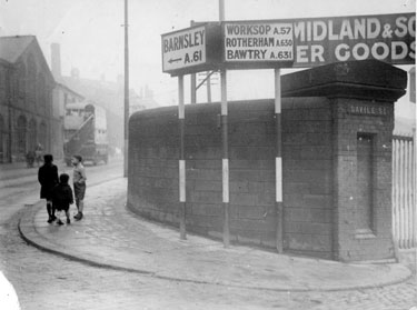 Entrance to London Midland and Scottish Railway Wicker Goods Station and electric direction sign on corner of Spital Hill and Savile Street