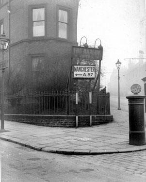 Junction of Glossop Road and Hounsfield Road, No 334, Harley Hotel, illuminated classified road sign used where the obvious route does not happen to be the main road 	