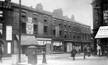 Exchange Street from Haymarket, including No. 1 Charles and Co., hosiers, Nos. 3 - 5 British Furnishing Co., house furnishers. Shops demolished 1913