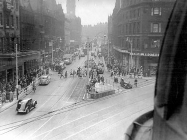 Elevated view of Fargate from High Street, Nos. 4 - 6 High Street, Boots Chemist, left, Cole Brothers, department store and 'Cole's corner', right
