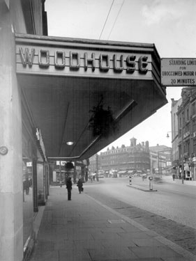 Fargate looking towards Town Hall Square from outside Nos. 33 - 35 James Woodhouse and Son, house furnishers, 1950-1955