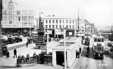 Fitzalan Square looking towards C and A Modes Ltd., Nos. 59 - 65 High Street and Haymarket, Transport Offices, foreground