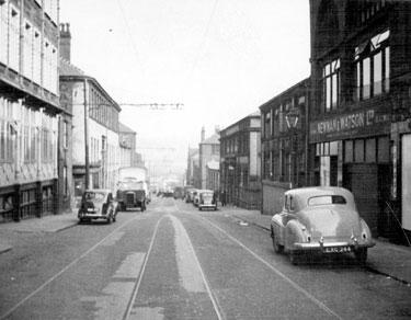 Furnival Street from Moorhead, (on right) No. 10 Newman and Watson Ltd., plumbing contractors, No. 12 United Yeast Co. Ltd., yeast manufacturers, Kerry's (Great Britain) Ltd., motor accessories (Kerry House), Newton Chambers Ltd. Newton House, left