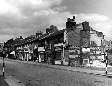 Hereford Street after the demolition of Nos. 45 - 47 Bridge Inn, premises still remaining include No. 41 A.P. Smith and Bros. Ltd., butchers, No. 39 Fras. Turner, tobacconist, No. 35, Ernest Speechley, snack bar