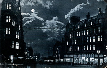 Night view of High Street from Church Street, Pawsons and Brailsford, Parade Chambers, left, Foster's Buildings, right