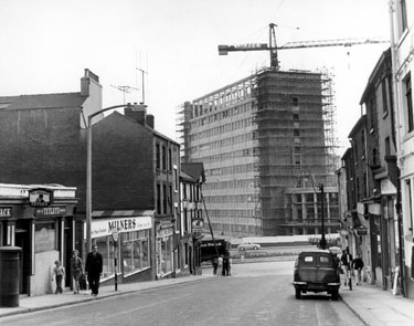 Howard Street, premises on left include No. 45 The Cossack public house, No. 53 Milners, house furnishers, No. 57 Howard Hotel, showing (background) construction of Sheaf House 