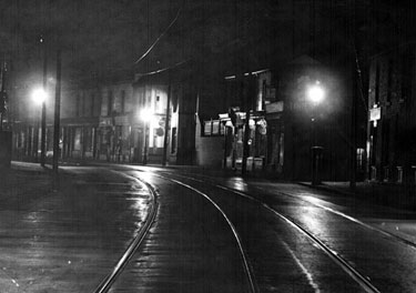 Street lighting on Langsett Road from Cuthbert Bank Road showing Fred Ketton's store with clock and other premises
