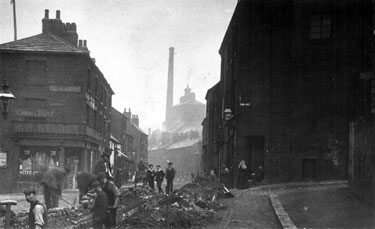 Pond Street at junction with Pond Hill, No. 64 John Young, hay and straw dealer, right, Nos. 63 and 65 William R. Storey, grocer, Pond Street Brewery in background