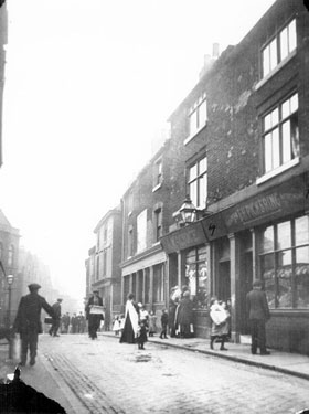 No. 71 E.H. Pickering, greengrocer; 69, 67/65, Old Hussar public house; 61/59 Farmyard Vaults public house, Scotland Street