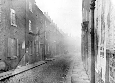 Spring Street showing entrance to Court No. 3 (passageway right) and Spring Street Works (right), looking towards Hicks Street and Workhouse Lane (left)