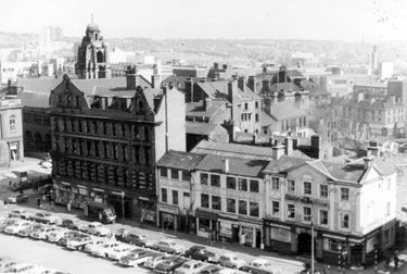 Nos. 1 - 13 Tudor Way from roof of Central Library. Premises include Wilks Bros. and Co. Ltd., ironmongers (on corner of Norfolk Street) and No. 13 Adelphi Hotel, right, later the site of Crucible Theatre