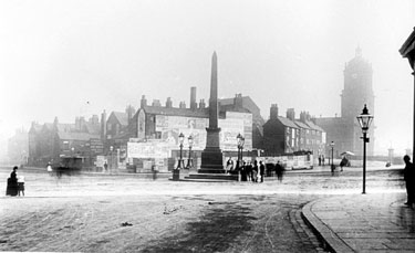 Jubilee Monolith, Town Hall Square, from Leopold Street, prior to construction of Town Hall. Pinstone Street, Cheney Square and St. Paul's Church, right, Surrey Street, left, showing rear of premises fronting New Church Street