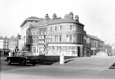 West Bar traffic island and junction with Corporation Street showing Nos. 94 - 96 Ellis Pearson and Co., glass bevellers, No. 100 Old Gaiety P.H., (former Gaiety Theatre)	