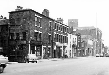 Nos. 104 - 70 West Street from Bailey Lane junction. Premises include Nos. 100/104 Morton Scissors, scissors manufacturers, No 100, Davidson and Co. (Steel Stamps) Ltd., mark makers, No. 94 Saddle Inn, Nos. 70 - 82 Co-operative Wholesale Society Ltd.
