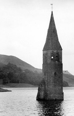 Ladybower Reservoir and the spire of St. James and St. John's C. of E. Church, formerly of Derwent village,