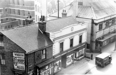 Elevated view of the former Scala Cinema and Nos. 28 - 30, S and E Co-op, Winter Street