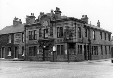 Queen Adelaide Hotel, No. 32 Bramall Lane and premises of No. 36 W.F. Caudle, upholsterer from junction with Hermitage Street