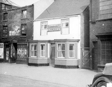 Bull and Oak public house (site of Sembly House), Nos. 76 - 78 The Wicker with Arthur Balfour and Co. Ltd., Capital Works (right)