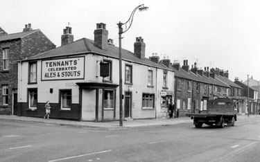 The Lambpool public house, No. 291 Attercliffe Common at the junction with Janson Street showing derelict property Nos. 295, 297, 299 etc.,