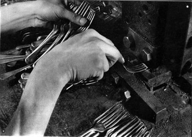 Removing bar from fork prong ends