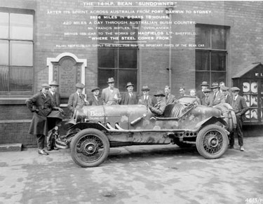 14-H.P. Bean 'Sundowner' after its sprint across  Australia. Mrs Francis Birtles brings his car to the works of Hadfields Ltd, where the steel comes from