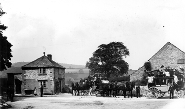 Froggatt Edge and Baslow Coach at Calver Sough with the outbuildings of the Eyre Arms (right)  the old Toll House  on the left