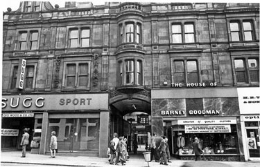 Pinstone Street showing (l. to r.) Nos. 127 - 131, H. H. B. Sugg Ltd., sports outfitters, entrance to the Cambridge Arcade and No 135, Barney Goodman, tailors
