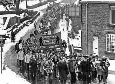 Protest march by striking steelmen through Stocksbridge during the steel strike of 1980