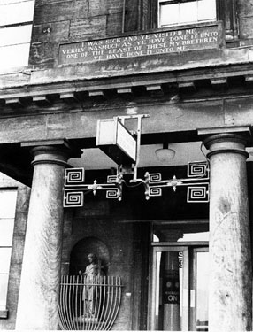 Inscription over the main entrance to the Royal Infirmary with Faith sculptured by Sir Francis Chantry (left)