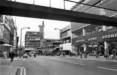 Haymarket from the junction with King Street looking towards Castle Market (showing) Nos. 12 - 18, British Home Stores, department store and 20 - 22 Montague Burton Ltd., tailors with the footbridge in the top foreground