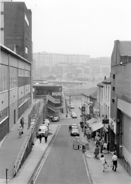 Elevated view of Dixon Lane looking towards Hyde Park Flats after part of them had been demolished