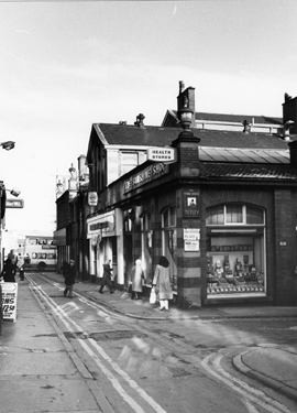 Orchard Street from the junction with Orchard Place looking towards Church Street showing the sign for The Stone House public house; Sunshine Food Store Ltd., The Sunshine Shop and Berni Inn Steak House 