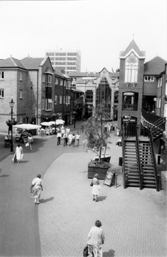 Elevated view of Orchard Square looking towards the Food Court and Church Street showing the clock and the housing for the Grinder and Buffer Automaton