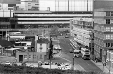 Elevated view of Pond Hill looking towards Pond Street multi storey car park with River Lane and Old Queens Head public house bottom left
