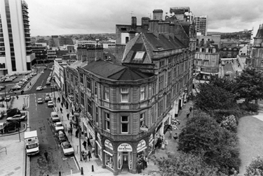 Elevated view from The Town Hall Extension of St. Pauls Chambers and Prudential Building, St. Pauls Parade; No. 172, Army and General Stores Ltd., Norfolk Street; Redvers House and Union Street (left); the Peace Gardens and Cross Bur
